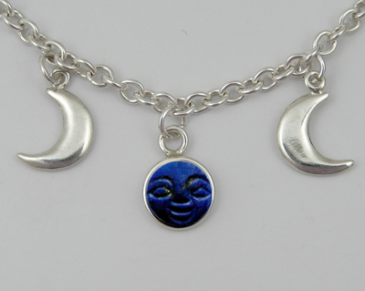 Sterling Silver Carved Moonface Moon Phases Necklace With Carved Lapis Lazuli Moonface,